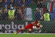BORDEAUX, FRANCE - JULY 02: Gianluigi Buffon of Italy saves the penalty by Thomas Mueller of Germany at the penalty shootout during the UEFA EURO 2016 quarter final match between Germany and Italy at Stade Matmut Atlantique on July 2, 2016 in Bordeaux, France.  (Photo by Alexander Hassenstein/Getty Images)